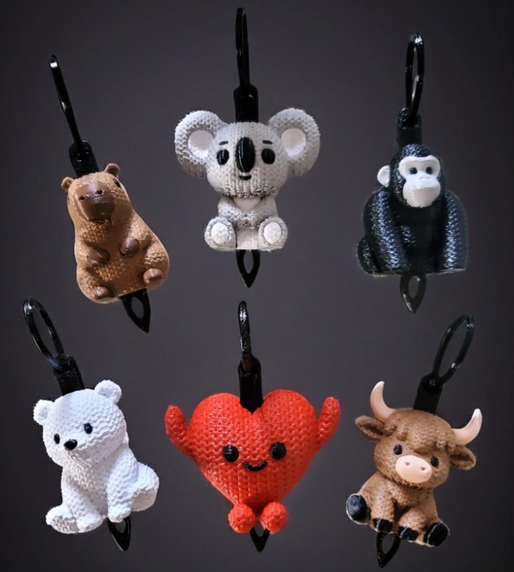 Colorful 3D printed Pickle Palz™ collectible bag charms